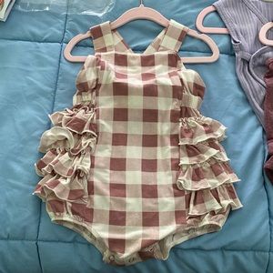 18-24 month can criss cross or have the back straps like overalls